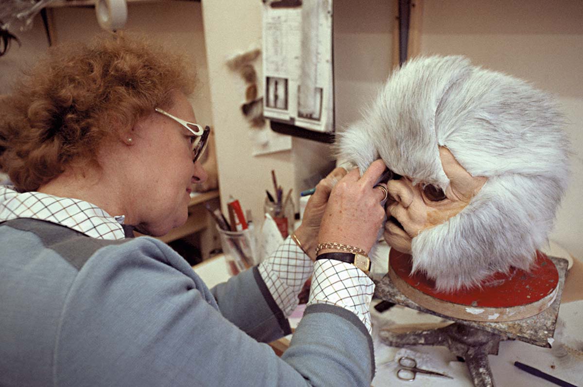 Makeup artist Kay Freeborn creates an Ewok mask.