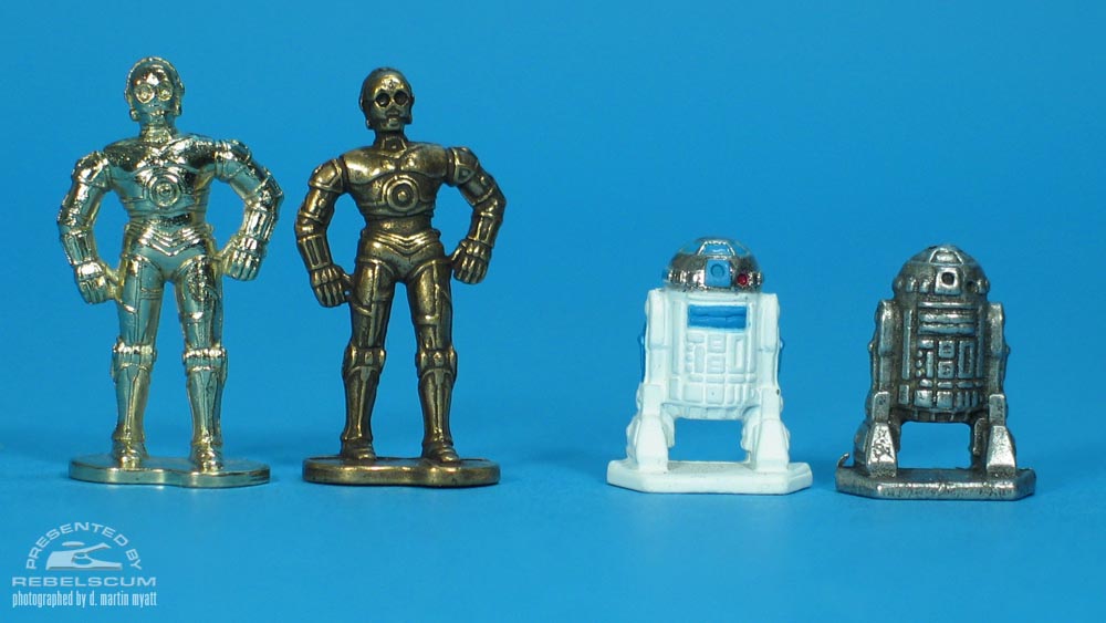 From Left To Right- Real See-Threepio, Fake See-Threepio, Real Artoo-Detoo, Fake Artoo-Detoo