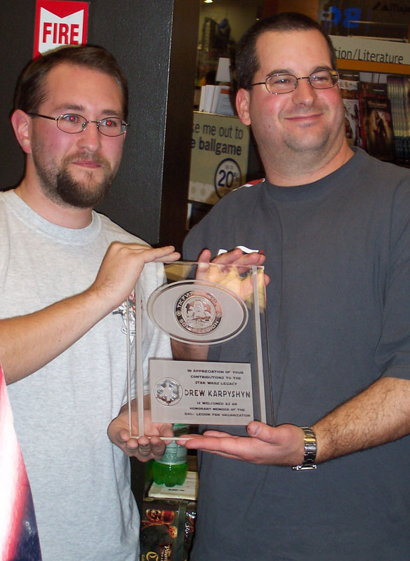 Old Line Garrison XO Bryan White presents plaque to Drew Karpyshyn