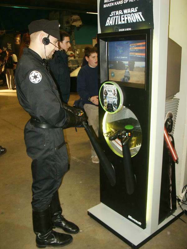 Imperial Officer enjoying some Battlefront (X-Box)