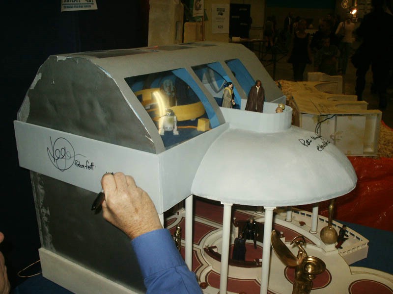 Jeremy signing the dioramas